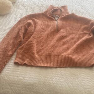 Burnt orange sweater,size large with knitted fabric